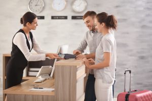 Guest satisfaction: Receptionist Assisting Customers